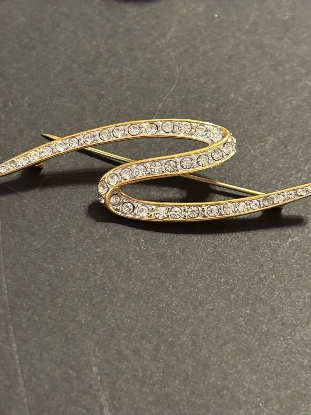 Signed Monet Gold Tone Clear Rhinestone Swirl Ribbon Brooch Pin Vintage Elegant